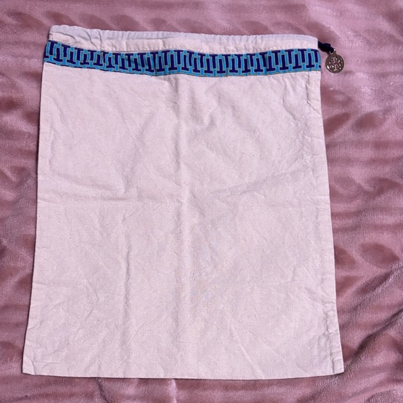 Tory Burch Handbags - Tory Burch 12x18 In. Ivory Jewelry Bag W Blue/ Purple Logo Trim & Gold Coin Pull